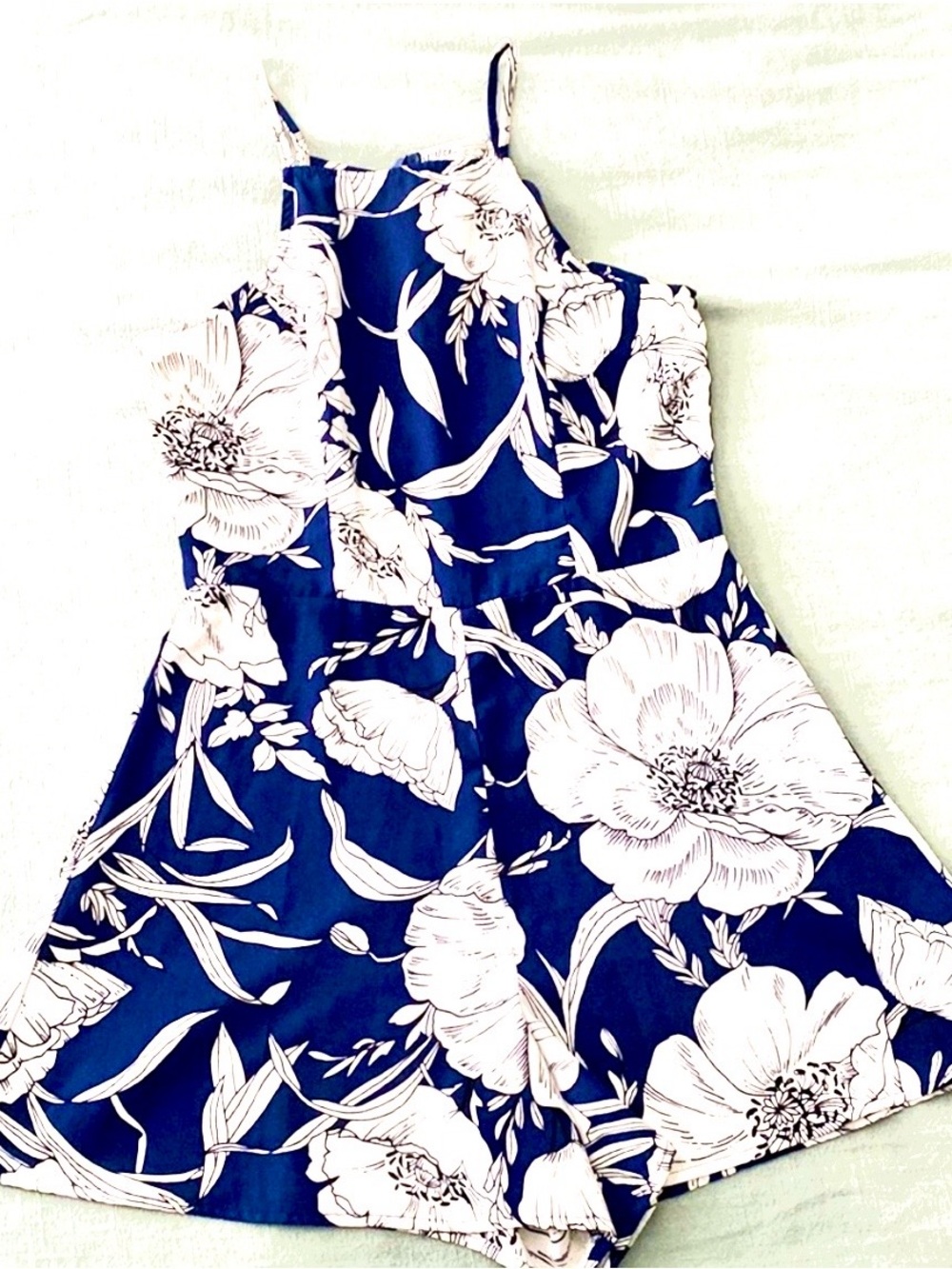 Blue Rain romper; floral navy blue and white